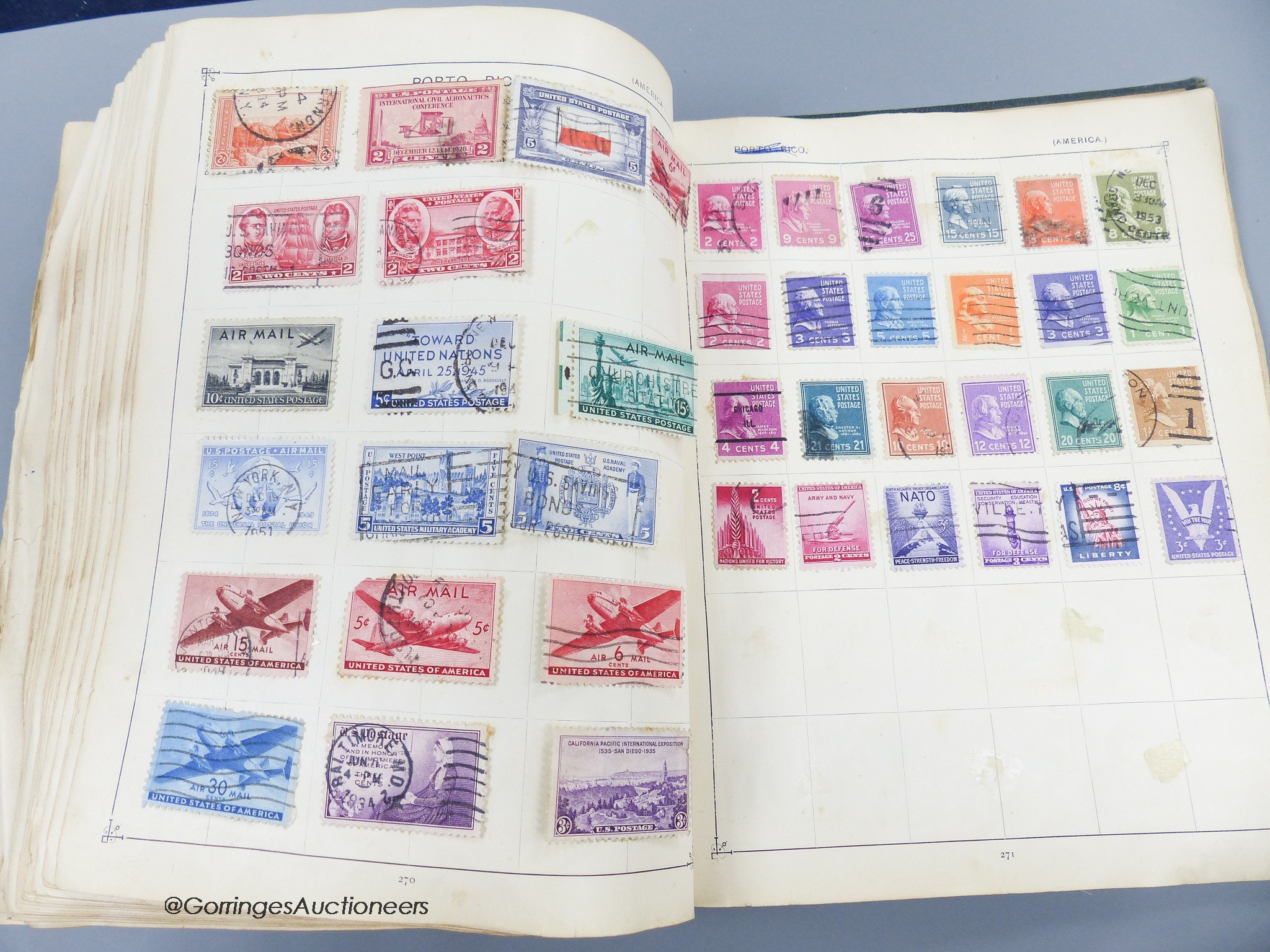 A suitcase of mostly early world stamps in albums packets with a 1937 coronation, 1945 victory album leaves, loose packets, some postal covers (affected by damp)